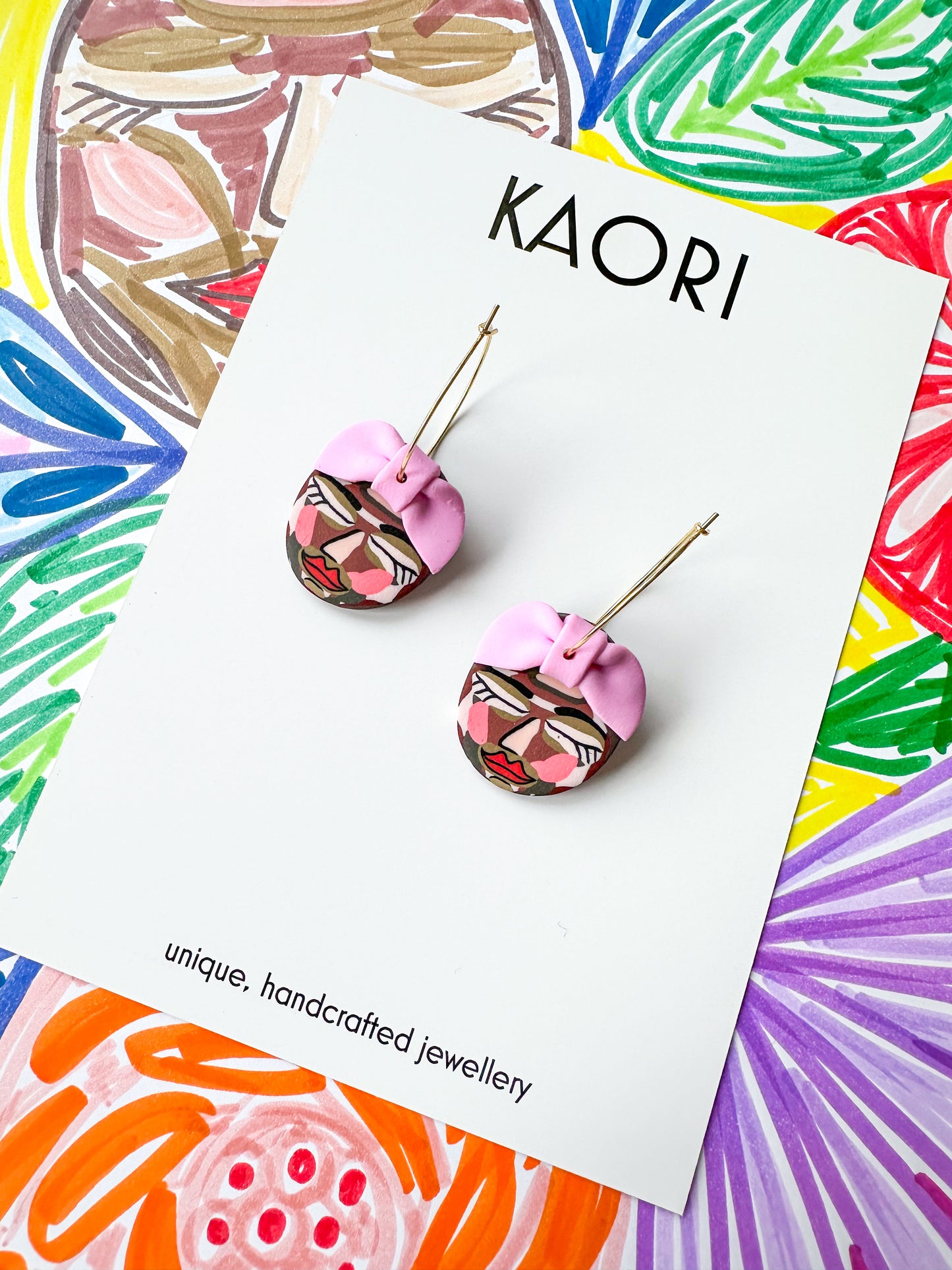 Abstract Face Hoop Earrings  - Pink