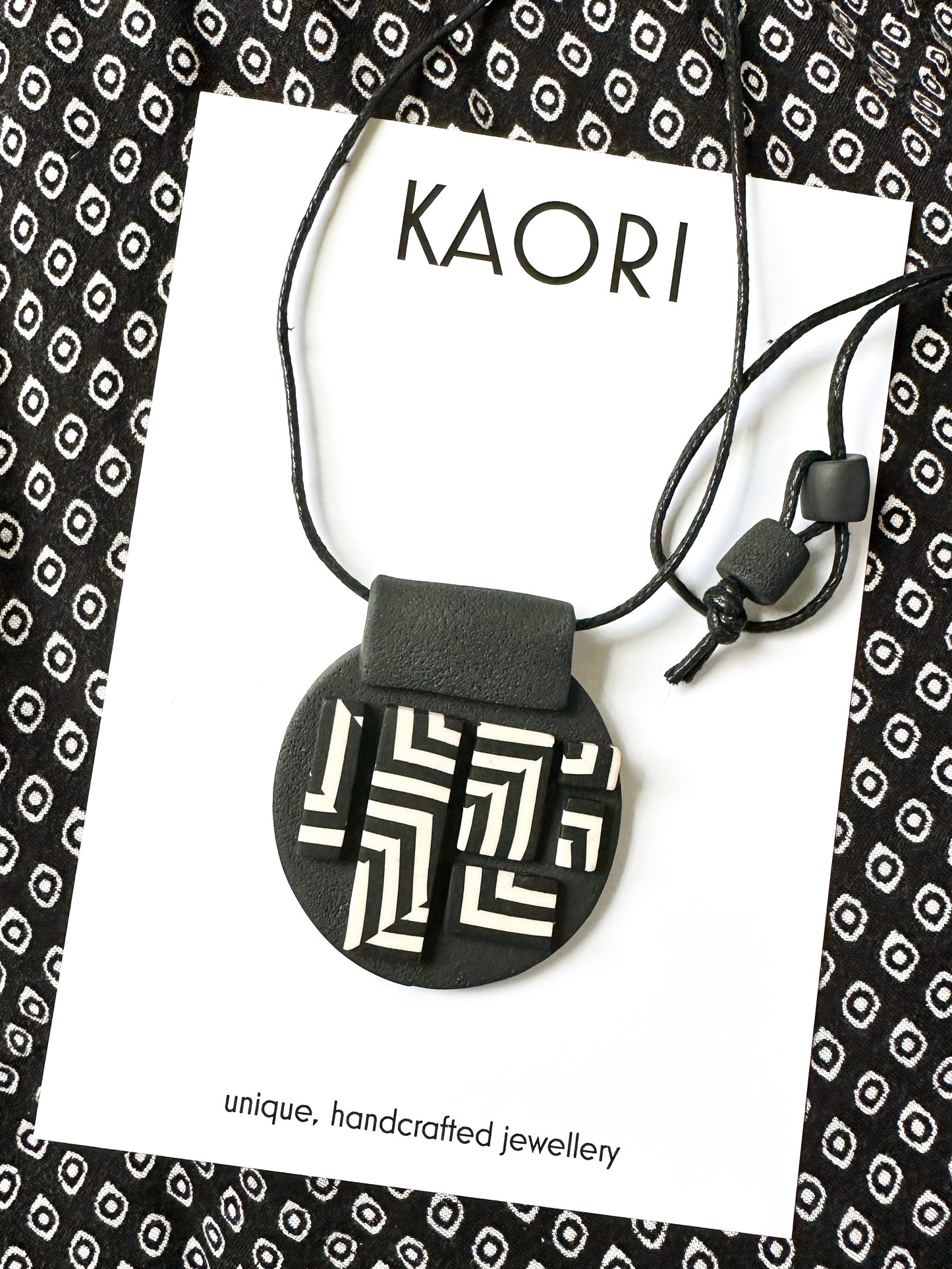 Black and Ivory Stripe Pendant Necklace on adjustable length cotton cord